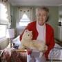 Mary Derr, 93, held her robotic cat in her South Kingstown, R.I., home. Hasbro wants to enhance its ?Joy for All? cat to assist seniors, and the toymaker and Brown University have received a three-year, $1 million grant.