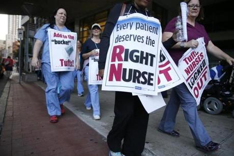 Boston, MA -- 7/17/2017 - Tufts nurses continued to picket around 6:30 this morning before heading back to work after a one day strike followed by a lockout. (Jessica Rinaldi/Globe Staff) Topic: 18nurses Reporter:
