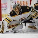 Boston Bruins goalie Anton Khudobin (35) makes a save during the first period of an NHL hockey game against the Buffalo Sabres, Tuesday Dec. 19, 2017, in Buffalo, N.Y. (AP Photo/Jeffrey T. Barnes)