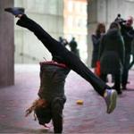Boston-12/22/2017 A happy Beatrice Graf, 9, a third-grader at Mission Hill School does a somersault at a small showing of parents and students at City Hall. She was happy because her school start time will not change and she just found out about it when she arrived with her mother. Parents came to voice their concern about the start time of elementary schools in Boston. Even though superintendent Chang has decided not to implement the new start times, people still showed up to voice future concerns.John Tlumacki/Globe staff (metro)