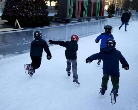 12/22/2017 Boston Ma-Boston Winter on Cty Hall Plaza ice skaters. Jonathan Wiggs\Globe Staff Reporter:Topic. 
