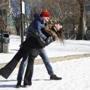 Boston, MA -- 12/27/2017 - Gabi Wasserman, of Arizona, (L) and Floralie Adam, of Quebec, didn't let the cold weather deter them from dancing West Coast Swing to the music playing for the ice skaters on the Frog Pond. (Jessica Rinaldi/Globe Staff) Topic: Reporter: 