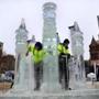 Bob Badger (left) and Matt Palmer worked on ice sculptures in Copley Square.