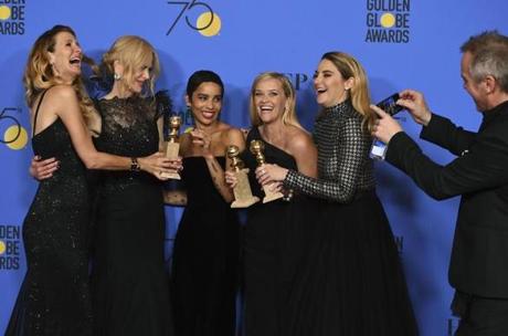 Laura Dern, from left, Nicole Kidman, Zoe Kravitz, Reese Witherspoon and Shailene Woodley pose as Jean-Marc Vallée, right, takes a photo in the press room with the award for best television limited series or motion picture made for television for 
