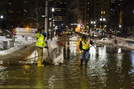 Crews worked to clean up the mess on Congress Street.
