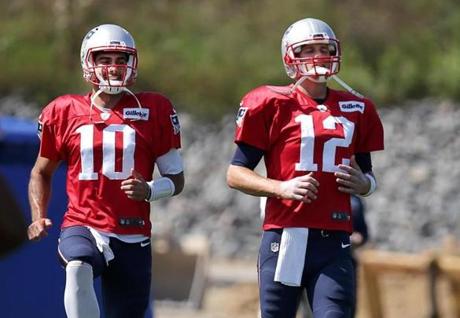 09/13/2017 Foxboro Ma New England Patriots QB's Jimmy Garoppolo (cq} left and Tom Brady (cq) right at Football Practice. Jonathan Wiggs\Globe Staff Reporter:Topic. 

