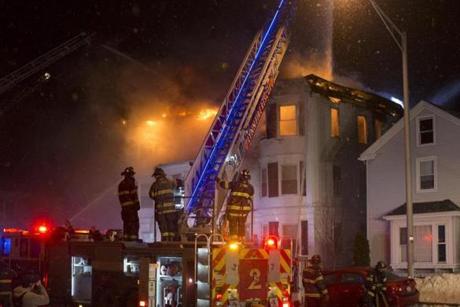Firefighters battled a blaze that consumed a multi-story apartment building in Lynn. 
