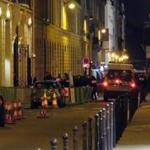 French police attend the scene outside the Ritz Hotel in Paris, France, after a robbery Wednesday evening. 