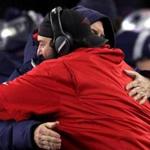 Foxborough, MA - 1/13/2018 - (4th quarter) New England Patriots head coach Bill Belichick shares an embrace with Defensive Cordinator Matt Patricia at the end of the game. The New England Patriots host the Tennessee Titans in a AFC Divisional Playoff game at Gillette Stadium in Foxborough. - (Barry Chin/Globe Staff), Section: Sports, Reporter: Ben Volin, Topic: 14Titans-Patriots, LOID: 8.4.605014565.