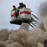 Firefighters used foam to fight a fire on Washington Street in Dorchester Tuesday.