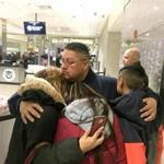 Jorge Garcia hugged his wife, Cindy Garcia, and their two children at Detroit Metro Airport moments before boarding a flight to Mexico. Garcia, who had lived in the U.S. for nearly 30 years, was deported to Mexico.