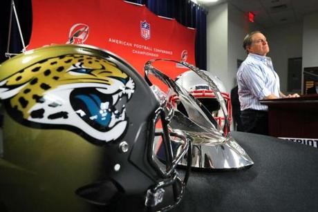 Foxboroughr-01/17/18- The Lamar Hunt AFC trophy was on display in the Patriot media room, as coach Bill Belichick speaks to reporters. The Patriots practiced at Gillette Stadium as they prepared for the AFC Championship game against Jacksonville. John Tlumacki/Globe staff(sports)
