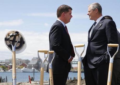 East Boston, MA - 5/19/2016 - Mayor Marty Walsh (L) talks with Governor Charlie Baker at a groundbreaking ceremony for 