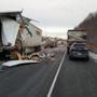 The crash spilled bottles of shampoo and other debris for about 300 yards on the highway.
