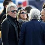 Jon Bon Jovi with Robert and Jonathan Kraft before Sunday?s game.