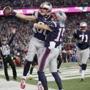 Foxborough, MA 1/21/2018 Patriots Chris Hogan lifts Danny Amendola after he made a touchdown in the fourth quarter. The New England Patriots host the Jacksonville Jaguars in an NFL AFC championship game at Gillette Stadium in Foxborough, Mass., Jan. 21, 2018.(Barry Chin/Globe Staff)