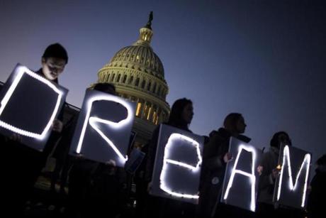 Demonstrators held illuminated signs during a rally supporting the Deferred Action for Childhood Arrivals program outside the US Capitol building last week. 
