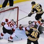 Brad Marchand (63) beat Devils goalie Cory Schneider late in the second period to give the Bruins a 3-2 lead. 