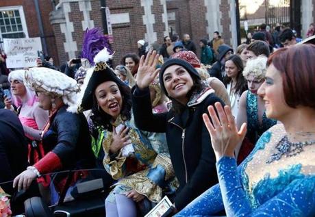 Hasty Pudding Theatricals' woman of the year, Mila Kunis, waved to people watching Thursday?s parade.
