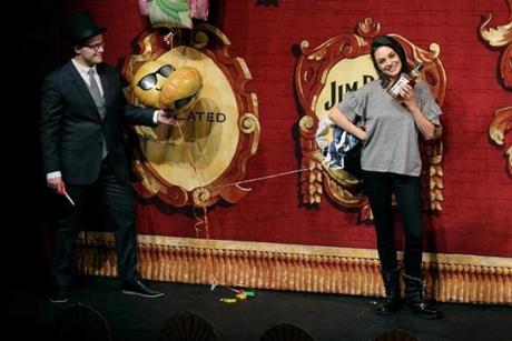 CAMBRIDGE, MA- JANUARY 25, 2018- : Mila Kunis does an impromptu commercial while being roasted in Cambridge, MA on January 25, 2018. Mila Kunis was awarded the Hasty Pudding Theatricals' Woman of the Year. (The event included Ms Kunis leading a parade through the streets of Cambridge, the Hasty Pudding Theatricals hosted a celebratory roast for the actress and presented the Pudding Pot at Farkas Hall, the Hasty Pudding's historic home in the heart of Harvard Square since 1888.) (Craig F. Walker / Globe staff) section: metro reporter: 
