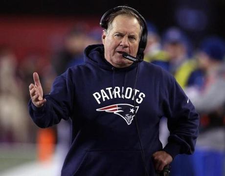 Foxborough, MA - 1/22/2017 - (4th quarter) - New England Patriots head coach Bill Belichick talking on the head set during the fourth quarter. The New England Patriots host the Pittsburgh Steelers in the AFC Championship game at Gillette Stadium in Foxborough, MA. - (Barry Chin/Globe Staff), Section: Sports, Reporter: Ben Volin, Topic: 23Patriots-Steelers , LOID: 8.3.1361625046.
