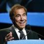 FILE - In this Jan. 15, 2015, file photo, Steve Wynn, CEO of Wynn Resorts, delivers the keynote address at Colliers International Annual Seminar at the Boston Convention Center in Boston. From a pair of giant golden dragons on the edge of a vast man-made lagoon to phoenix and cloud motifs throughout the interior, Wynnâ??s new multibillion dollar Macau resort brims with auspicious Chinese symbolism. The U.S. casino mogul will be hoping luck is on his side as he prepares to launch his Wynn Palace project in the Asian gambling hub, where growth is downshifting into a new phase after years of turbocharged expansion. (AP Photo/Elise Amendola, File)