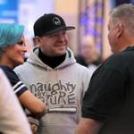 Donnie Wahlberg (center) and wife Jenny McCarthy chat up former Patriots offensive coordinator Charlie Weis at the Mall of America.