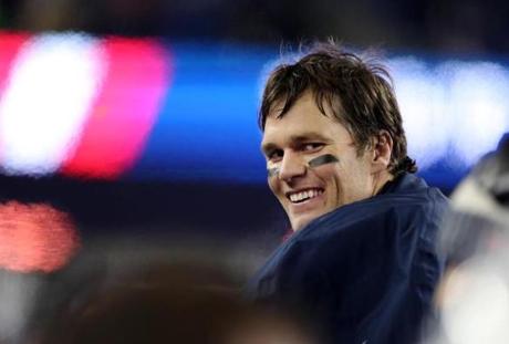 Foxborough, MA - 1/13/2017 - Tom Brady smiles on the sideline during the fourth quarter of the AFC Divisional playoff game between the New England Patriots and the Tennessee Titans at Gillette Stadium. ( Jim Davis / Globe staff)
