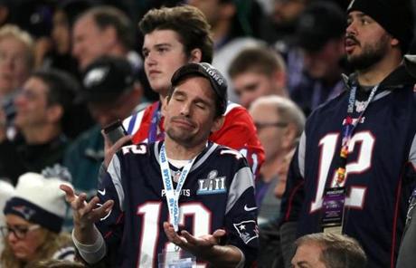 SUPER BOWL SLIDER4 Minneapolis, MN - 2/4/2018 - Frustrated Patriot fans during 2nd quarter of Super Bowl LII. The New England Patriots play the Philadelphia Eagles in Super Bowl LII at US Bank Stadium in Minneapolis on Feb. 4, 2018. (Jim Davis/Globe staff
