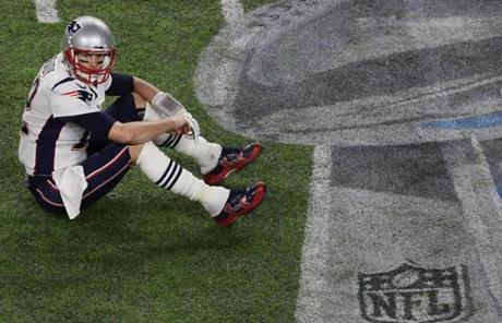 Tom Brady was dejected after he fumbled in the fourth quarter.

