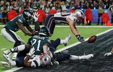 SUPER BOWL SLIDER6 Minneapolis, MN 2/4/2018: On the final play of the game, the Patriots Danny Amendola dives for the ball, but it has already bounced off the ground, and the Hail Mary pass from Tom Brady failed and the Eagles were Super Bowl champions. The New England Patriots play the Philadelphia Eagles in Super Bowl LII at US Bank Stadium in Minneapolis. (Jim Davis/Globe Staff)
