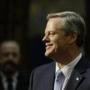 Governor Charlie Baker on Thursday called for a slower, two-phase rollout of the voter-approved marijuana industry.