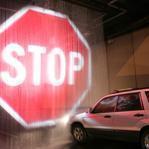 If a vehicle that?s too tall to fit in the Sydney Harbour Tunnel gets too close to its entrance, a holographic-like image of a giant stop sign is projected onto a curtain of water.