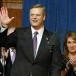 Massachusetts Gov. Charlie Baker waves after delivering his State of the State address as Lt. Gov. Karyn Polito, right, looks on at the Statehouse in Boston, Thursday, Jan. 21, 2016. (AP Photo/Michael Dwyer)