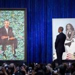 Barack Obama examined the portraits during Monday?s unveiling.