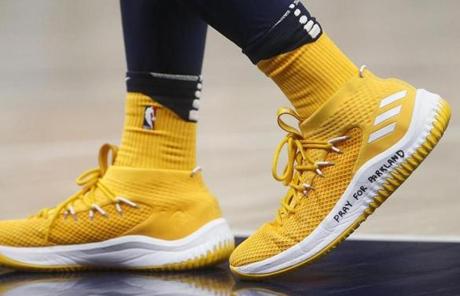 SCHOOL SHOOTING SLIDER Utah Jazz guard Donovan Mitchell wears a shoe with 