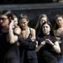 Mourners leave the funeral of Meadow Pollack, a victim of the Wednesday shooting at Marjory Stoneman Douglas High School, in Parkland, Fla., Friday, Feb. 16, 2018. Nikolas Cruz, a former student, was charged with 17 counts of premeditated murder on Thursday. (AP Photo/Gerald Herbert)
