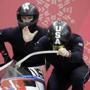 Driver Codie Bascue and Samuel McGuffie of the United States prepare to start a run during the two-man bobsled training at the 2018 Winter Olympics in Pyeongchang, South Korea, Friday, Feb. 16, 2018. (AP Photo/Wong Maye-E)