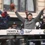 Boston, MA--2/7/2017 - Tom Brady caught this ball from someone in the crowd on Tremont Street. Alex Guerrero at left. The New England Patriots Super Bowl Parade 2017 rolls through Boston. Photo by Pat Greenhouse/Globe Staff Topic: 08parade Reporter: XXX