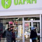 People walked past an Oxfam charity shop in south London.
