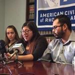 Lilian Calderon spoke at a news conference in Rhode Island after she was detained by ICE as she attempted to apply for legal permanent residency. Luis Gordillo, her husband, is at right.