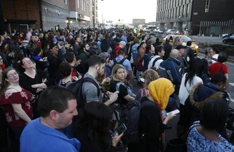 South Boston, MA -- 2/21/2018 - Mobs of people wait for shuttle busses after exiting the Red Line at Broadway Station in South Boston. (Jessica Rinaldi/Globe Staff) Topic: 22commute Reporter: 
