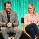 HOLLYWOOD, CA - MARCH 18: Actor Nick Offerman (L) and actress Amy Poehler speak during The Paley Center for Media's PaleyFest 2014 Honoring 