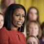 FILE - In this Friday, Jan. 6, 2017 file photo, Michelle Obama gives her final speech as first lady at the 2017 School Counselor of the Year ceremony in the East Room of the White House in Washington. Michelle Obama didn't say that the Florida school shooting is President Donald Trump's fault, despite a story spread on social media that says she did. (AP Photo/Manuel Balce Ceneta, File)