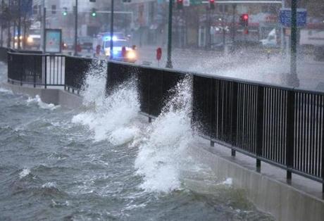 Water crashed over Seaport Blvd.
