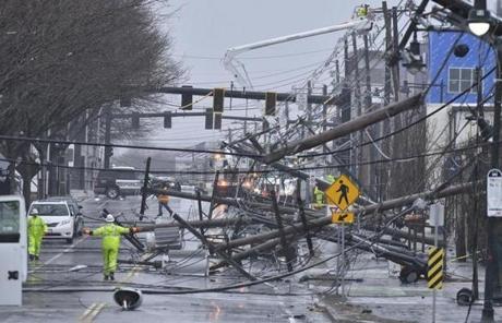 Utility poles and power lines fell on Arsenal Street in Watertown.
