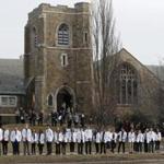Students from the New England College of Osteopathic Medicine lined the sidewalk outside the Winchester Unitarian Society Thursday.