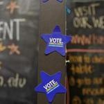 Student government voting magnets in Mason Hall during a ?Bagels and Ballots? event at the University of Michigan in Ann Arbor last month. 