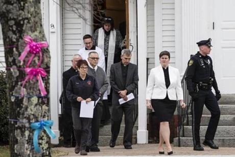 West Brookfield, MA - 3/4/2018 - Members of the clergy enter the First Congregational Church for a memorial service for a mother and three children found murdered in their home on Thursday in West Brookfield, MA, Mar. 4, 2018. (Keith Bedford/Globe Staff)
