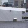 The two-story Harvard Sailing Center on the Charles River is slowly sinking in the wake of Thursday?s nor?easter. A compromised flotation device is apparently at fault, according to officials. 